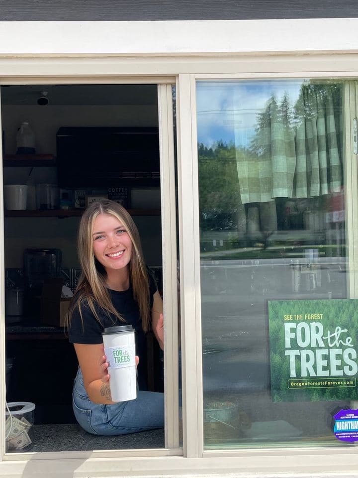APM cup sleeve and window cling campaign inside a coffee shop
